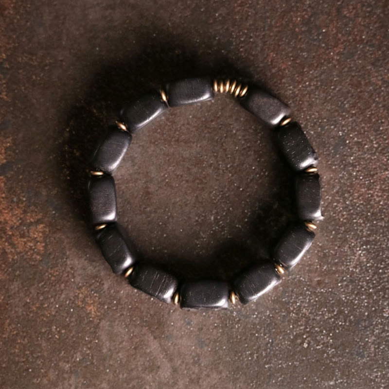Pulsera de equilibrio de paz de cobre estilo textura de madera de ébano retro con Buddha Stones