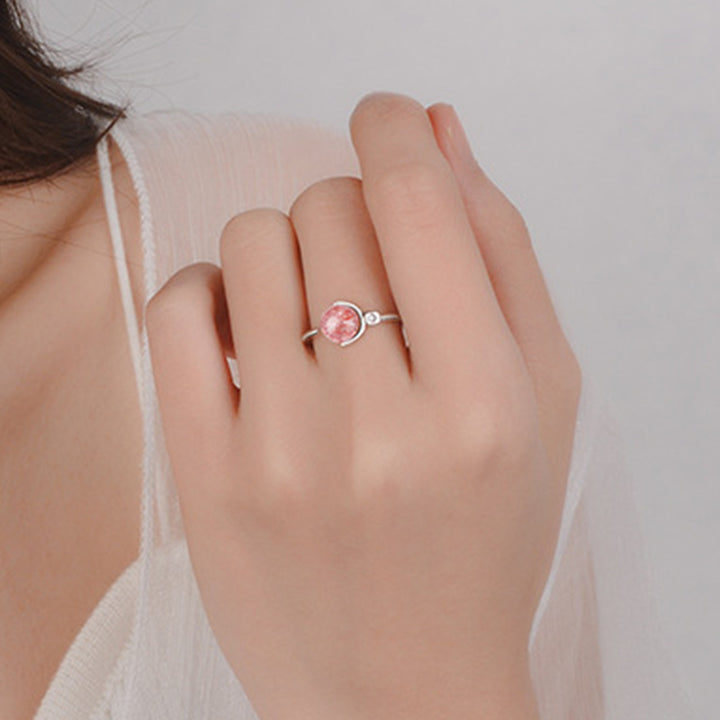 Anillo de rotación calmante de cristal rosa con Buddha Stones