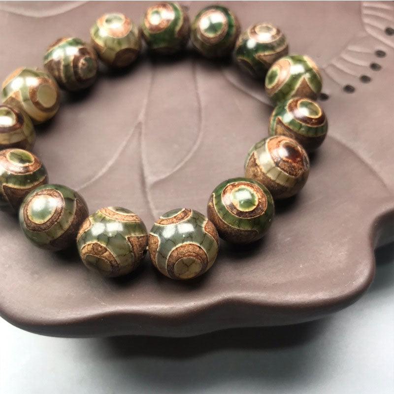 Pulsera de la Suerte de Sardonyx con Cuentas Dzi de Tres Ojos y Buddha Stones