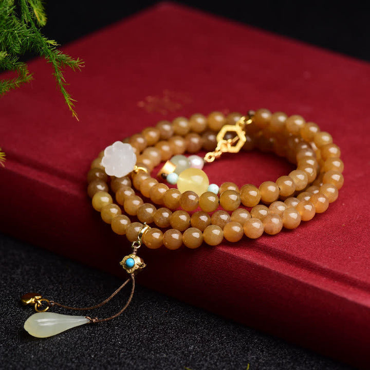 Pulsera de éxito de perlas de jade blanco de loto ámbar de topacio hetiano natural