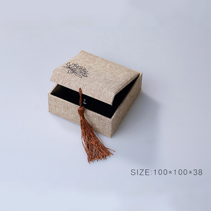 Caja de almacenamiento de joyería con diseño de loto y Buddha Stones, caja de regalo con borlas