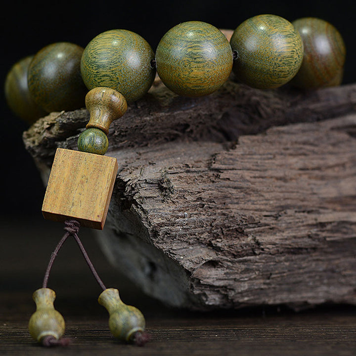 Pulsera curativa de sándalo verde tibetano con Buddha Stones - image 6