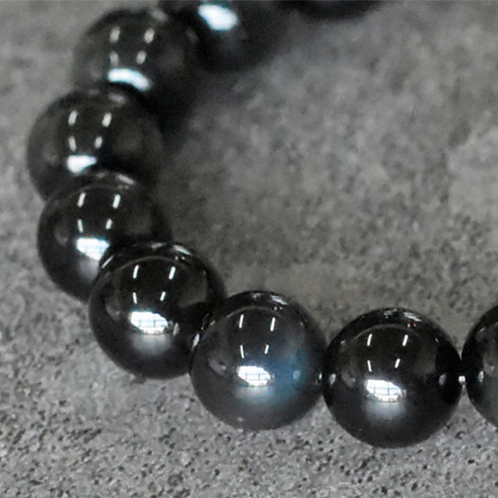 Pulsera de transformación positiva con cuentas de cobre y obsidiana arcoíris de Buddha Stones