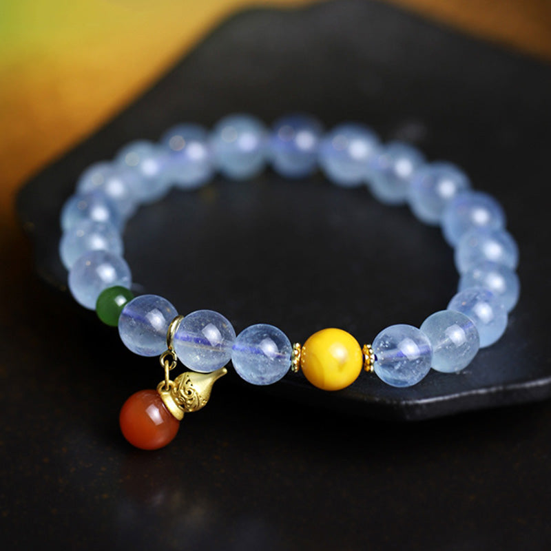Pulsera con dije de calabaza de la paz con ágata roja y aguamarina