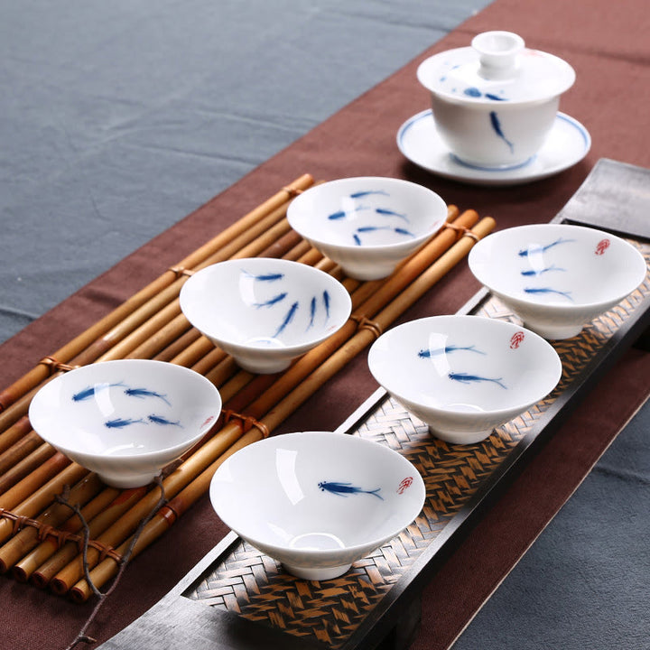 Buddha Stones Jingdezhen, porcelana azul y blanca, pez Koi, taza de té de cerámica, tazas de té de Kung Fu