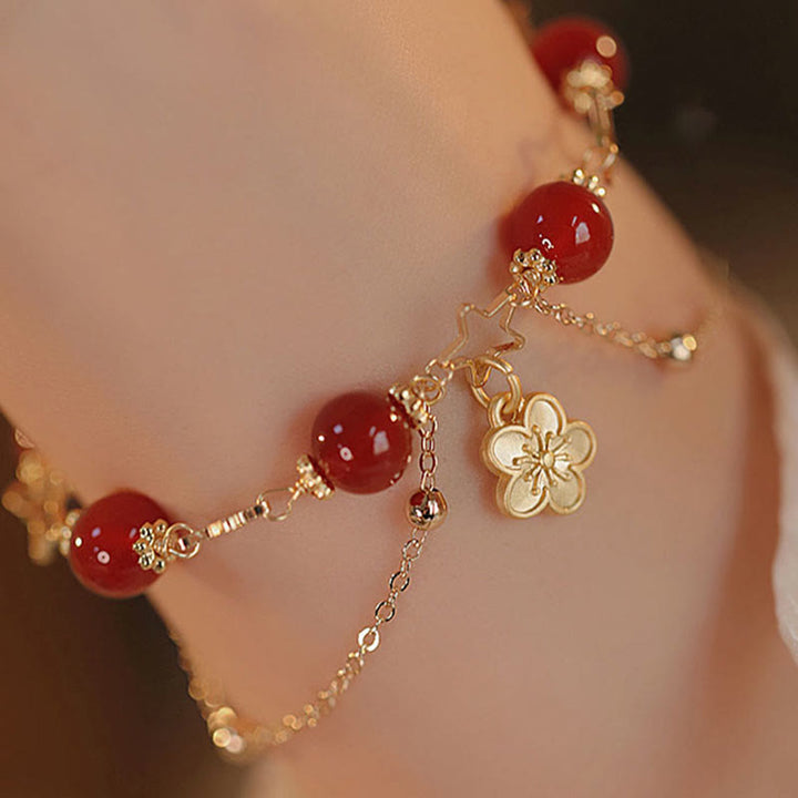 Pulsera tranquila con dije de flor de estrella de ágata roja chapada en oro de 14 Buddha Stones