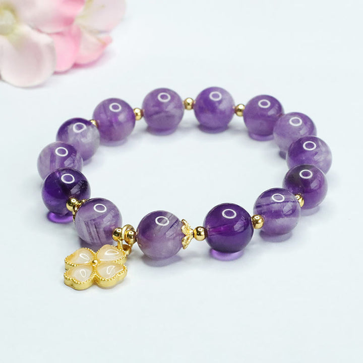 Pulsera con dije de trébol de cuatro hojas y paz interior de cristal de amatista natural con piedras de Buddha Stones