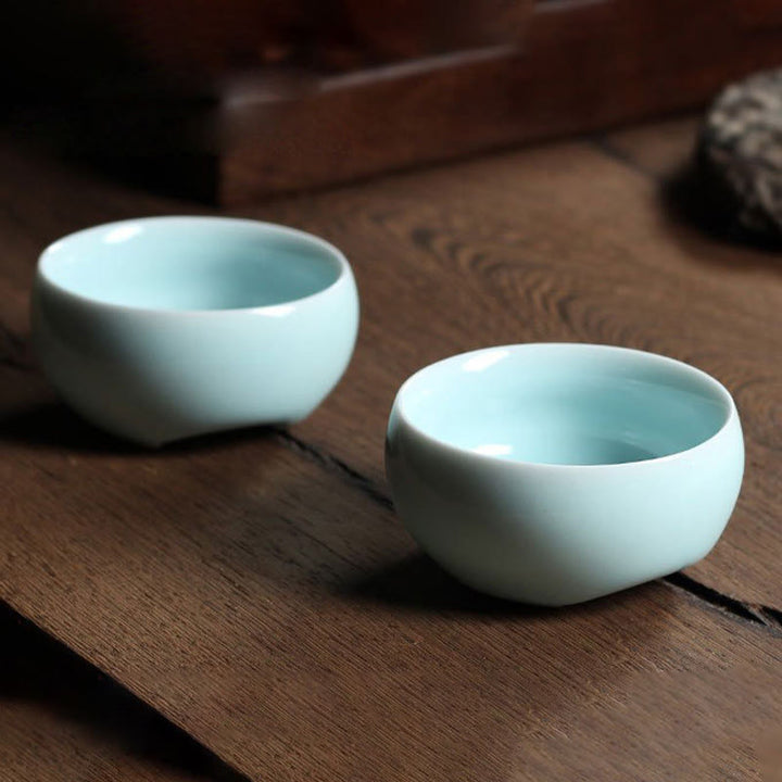 Taza de té de cerámica con forma de pez koi de colores y Buddha Stones