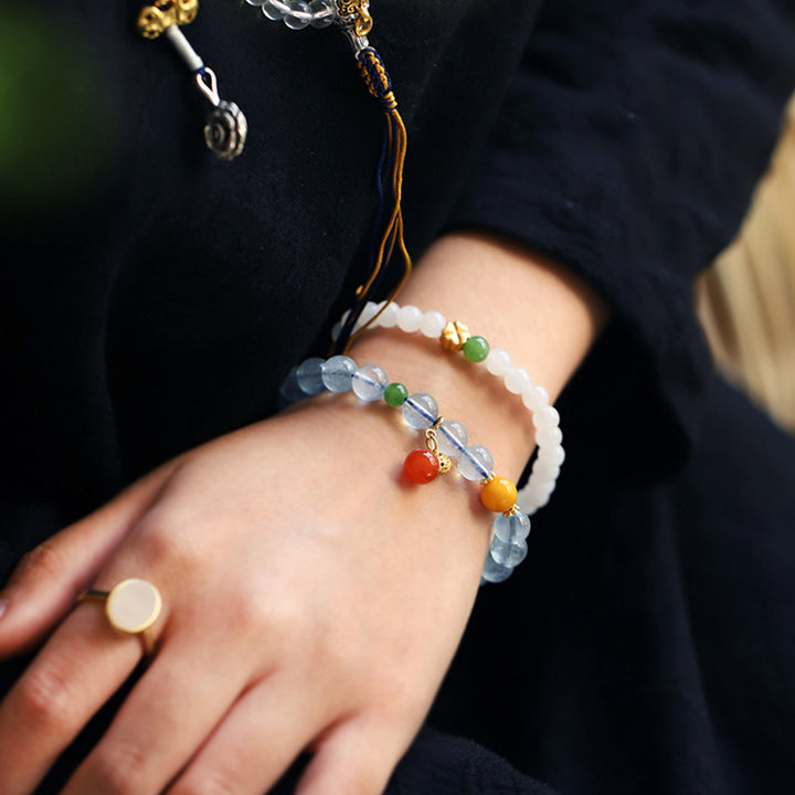 Pulsera con dije de calabaza de la paz con ágata roja y aguamarina
