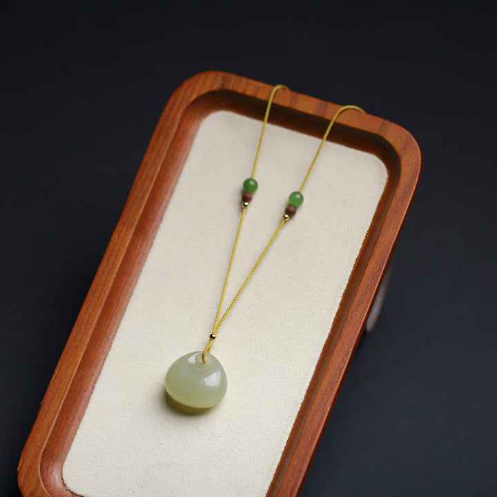 Colgante de collar de cadena de prosperidad con patrón de bolsa pequeña de jade hetiano natural