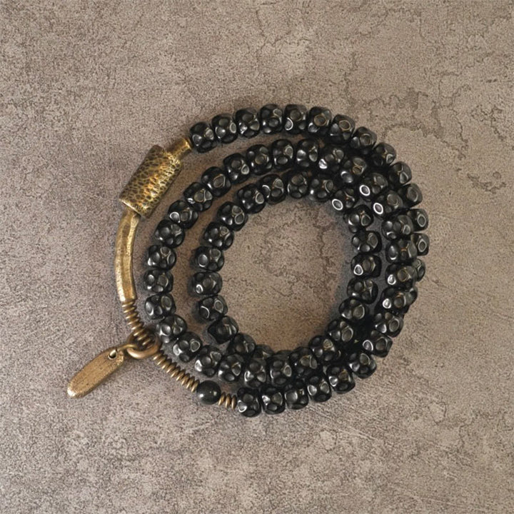 Pulsera de triple envoltura de cobre con concha de coco retro de Buddha Stones