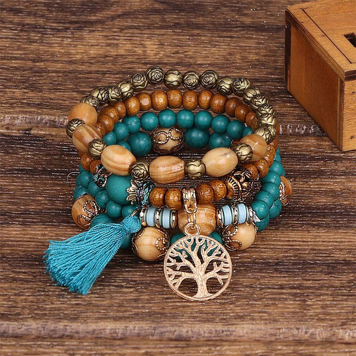 Pulsera curativa con borlas de árbol en capas de madera de wengué