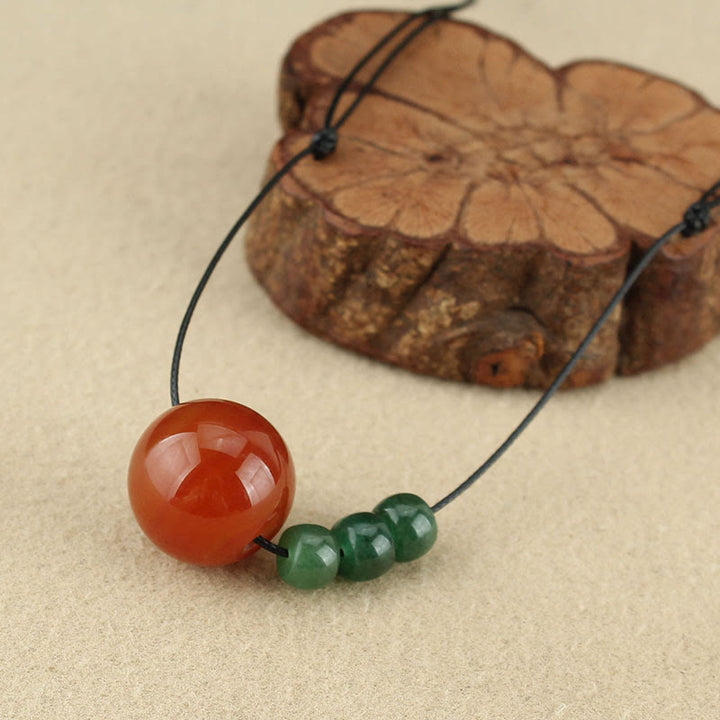 Buddha Stones, ágata roja, Aventurina verde, cuentas de semilla de Bodhi, collar de cuerda de cuero tranquilo, colgante
