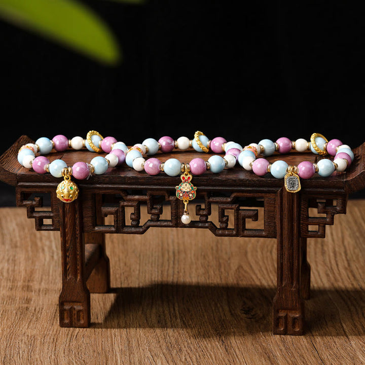 Buddha Stones tibetano Zakiram diosa de la riqueza conejo cabeza de león encanto Liuli vidrio incienso ceniza porcelana cuentas pulsera de protección
