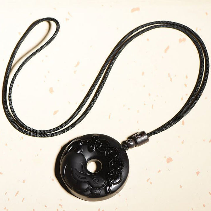 Collar con colgante de fuerza con hebilla de paz, obsidiana negra Natural del zodíaco chino , Buddha Stones - image 6