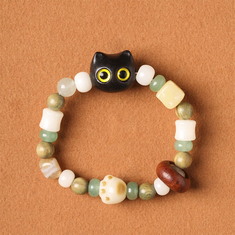 Buddha Stones, semillas de Bodhi, sándalo verde, madera de ébano, hoja pequeña, sándalo rojo, cabeza de gato, garra de pata, pulsera de la paz - Gato de madera de ébano (ojos amarillos) (circunferencia de muñeca: 14-16 cm) - image 15