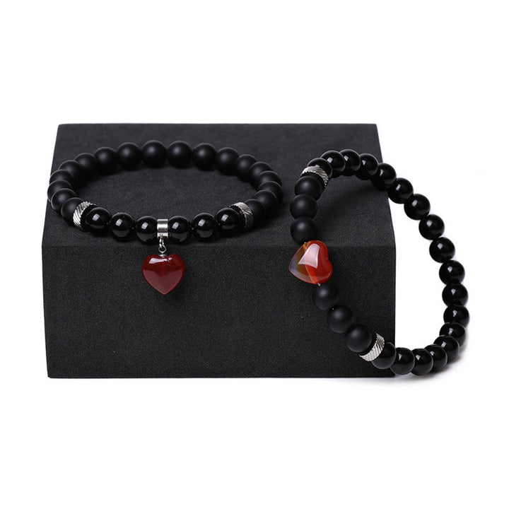 Buddha Stones 2 piezas de piedra de cristal de ónix negro amor protección del corazón pulsera de pareja