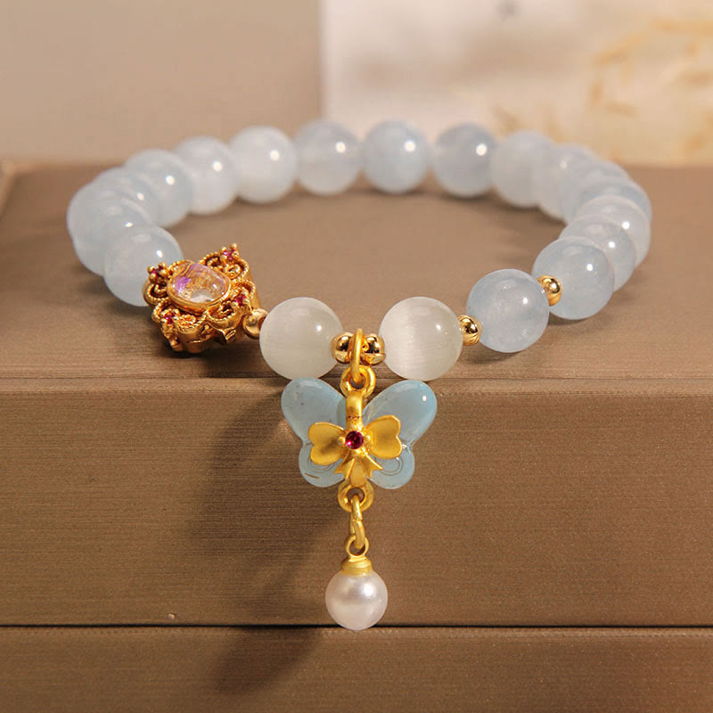Pulsera con dije de perlas y mariposas curativas con ojo de gato, aguamarina y Buddha Stones