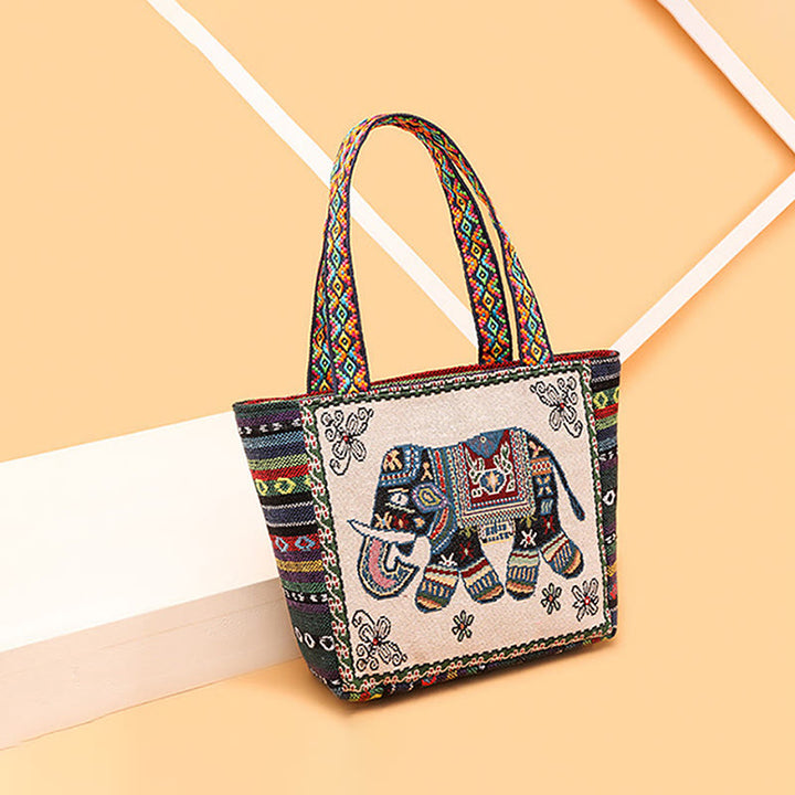 Bolso bandolera de lona de gran capacidad con bordado de mariposa y elefante - image 9