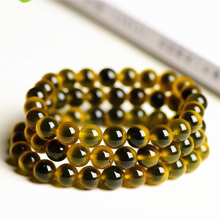 Pulsera de cuentas de fuerza de armonía de ágata de caramelo colorida natural de Buddha Stones
