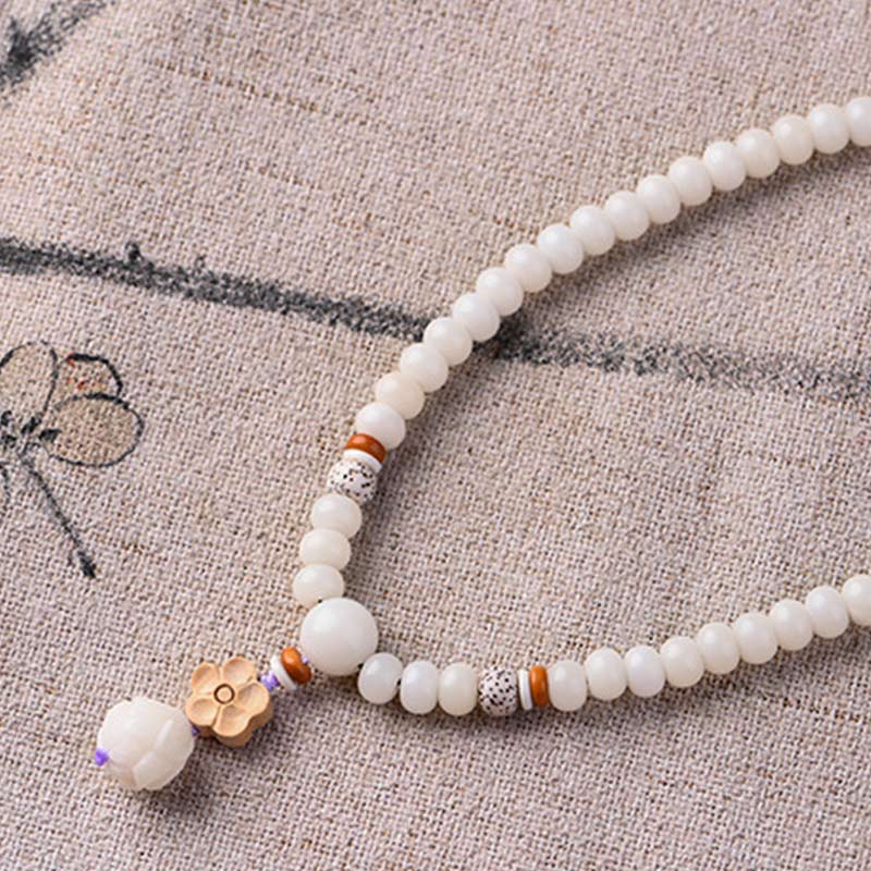 Pulsera de bendición de loto Bodhi de jade blanco tibetano con Buddha Stones