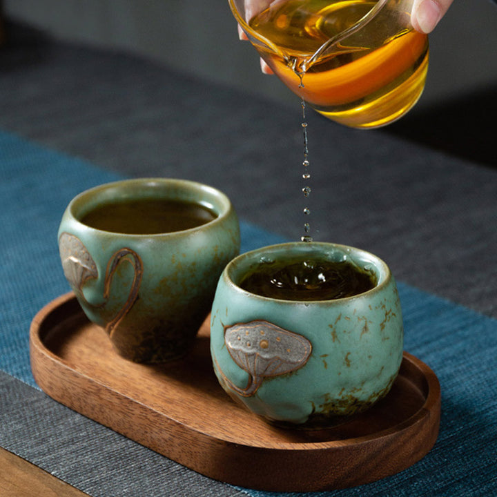 Taza de té de Kung Fu con Buddha Stones , vaina de loto grabada