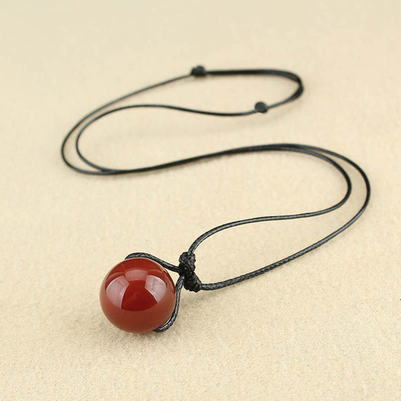 Collar con colgante de cuerda de cuero con cuentas de ágata roja y Buddha Stones