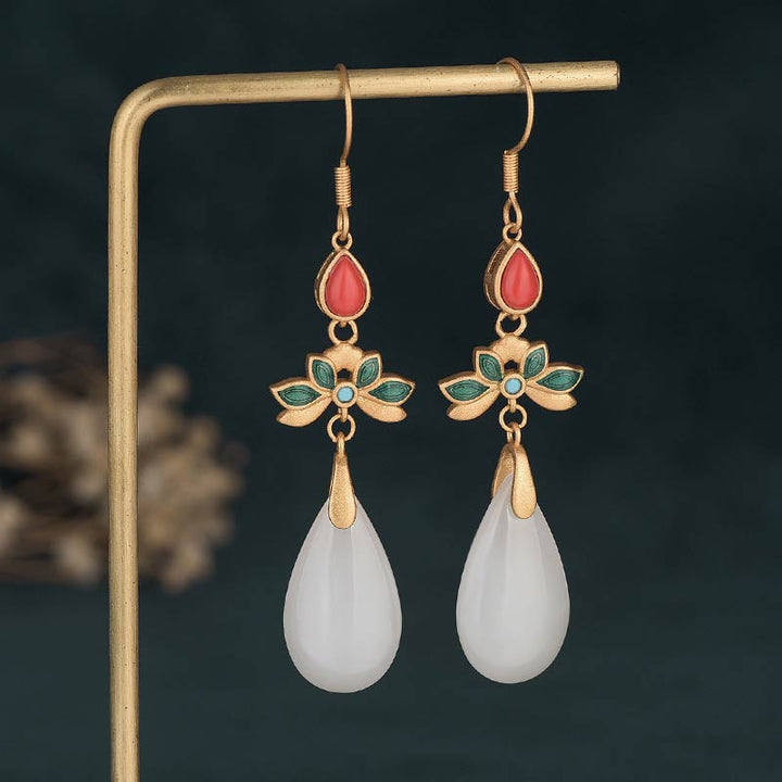 Pendientes colgantes de la suerte de jade blanco FengShui con Buddha Stones