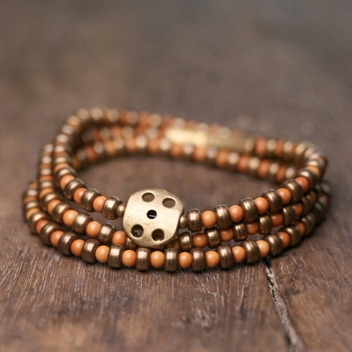 Pulsera de riqueza de cobre con hueso de olivo retro con Buddha Stones