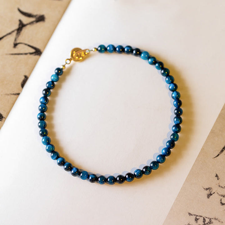 Pulsera de cadena de protección con piedra de ojo de tigre azul natural de Buddha Stones