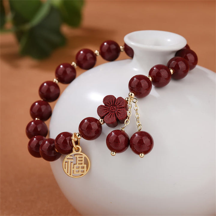 Pulsera de bendición de flor de cerezo con personaje de cinabrio Fu de Buddha Stones