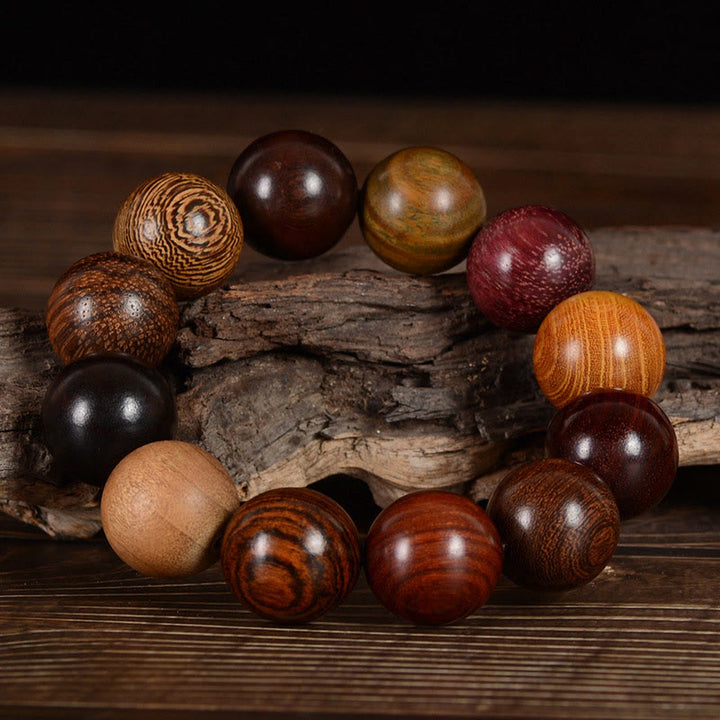 Pulsera curativa de protección de sándalo multicolor con Buddha Stones