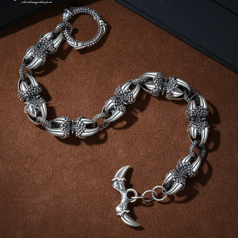 Pulsera de protección de fuerza grabada con garra de dragón de Buddha Stones