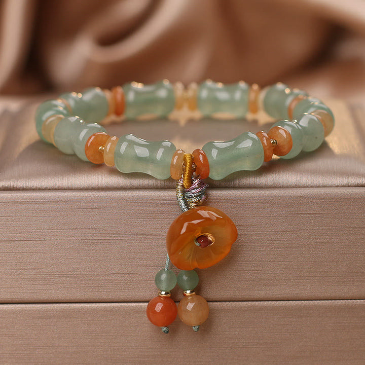 Pulsera de la suerte con patrón de flores de bambú y jade natural de Buddha Stones
