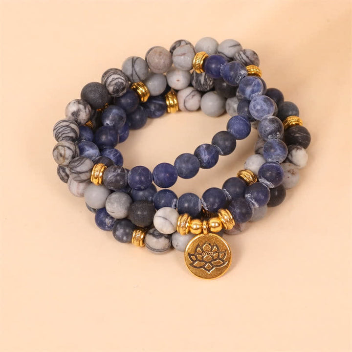Pulsera de fuerza de loto con Buddha Stones, 108 cuentas de Mala, sodalita, cebra, jaspe, cristal