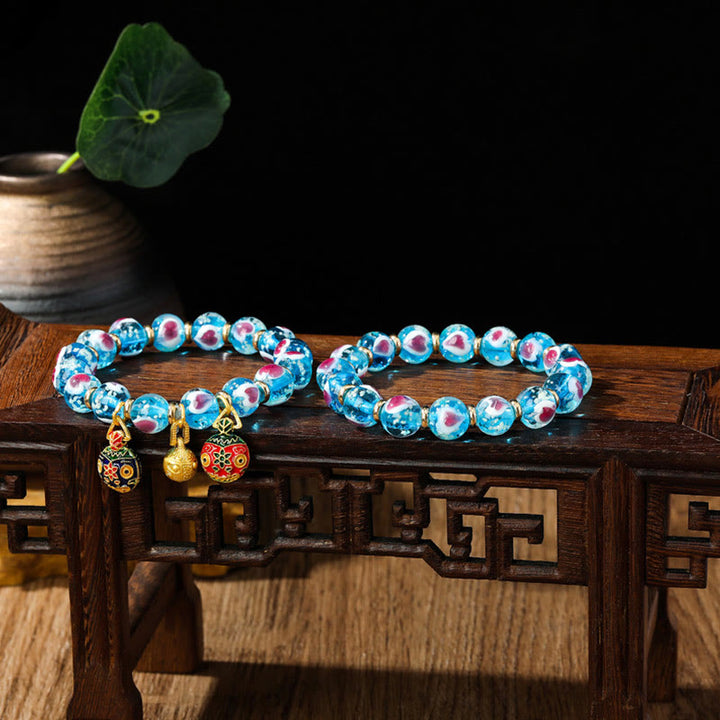 Pulsera de cuentas de cristal Liuli fluorescente luminosa con corazón de amor rosa de la familia de las bestias que tragan oro con Buddha Stones