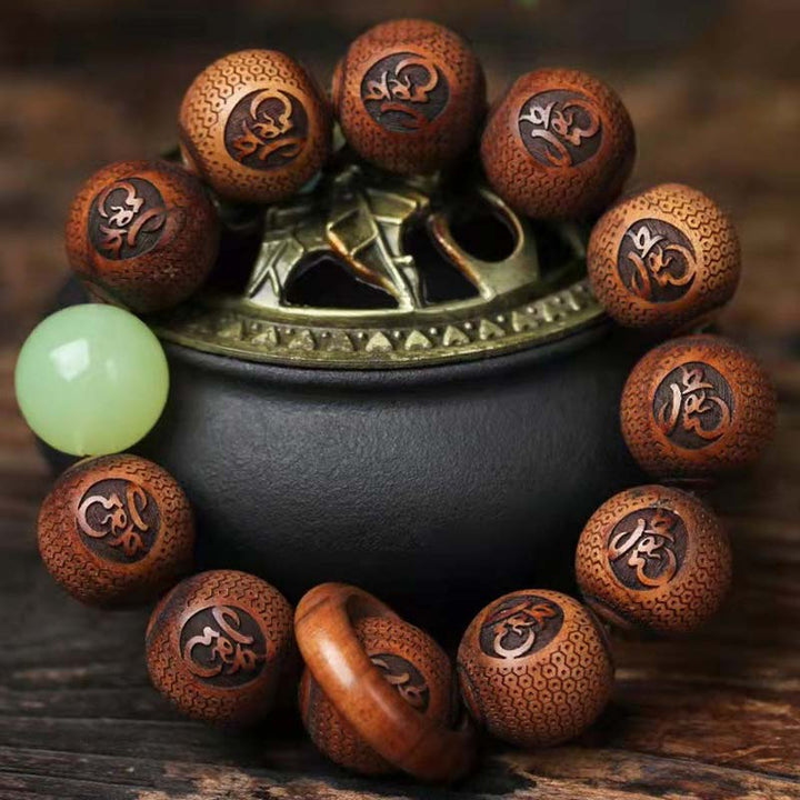 Pulsera de protección de tigre con grabado de palisandro tibetano con Buddha Stones