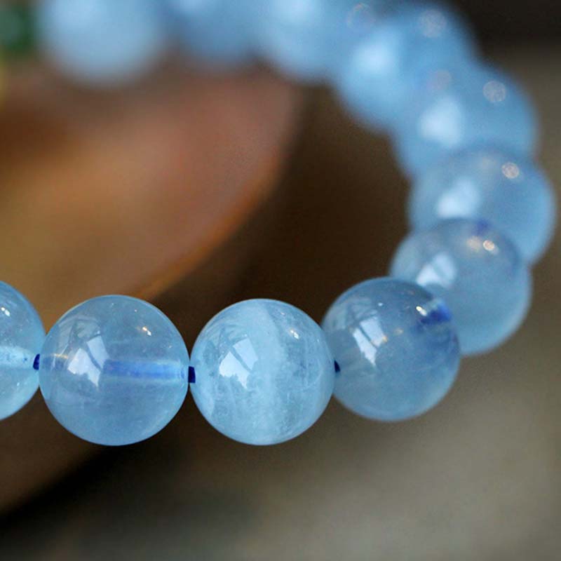 Pulsera curativa de serenidad con cuentas de ámbar y aguamarina natural