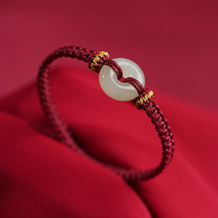 Pulsera trenzada de abundancia de jade con hebilla de paz de Buddha Stones