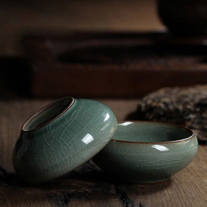 Taza de té de cerámica con forma de pez koi de colores y Buddha Stones
