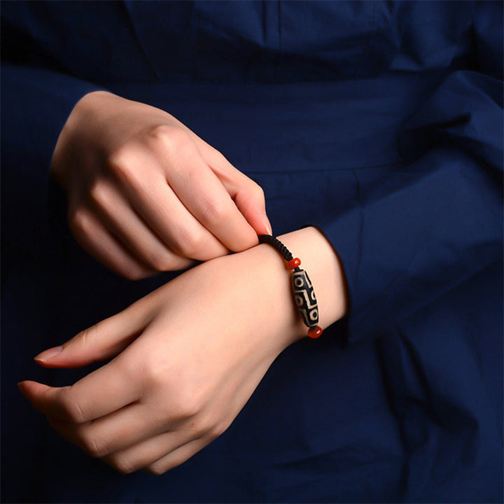 Pulsera de hilo de prosperidad con cuentas Dzi tibetanas de nueve ojos con Buddha Stones