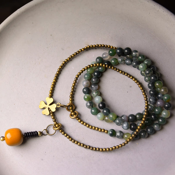 Pulsera multicapa de la suerte de cobre con ágata musgosa y Buddha Stones
