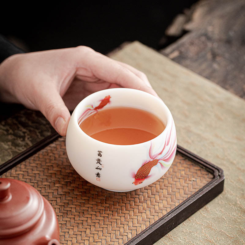 Taza de té de cerámica de porcelana blanca, pez Koi, Buddha Stones, taza de té de Kung Fu