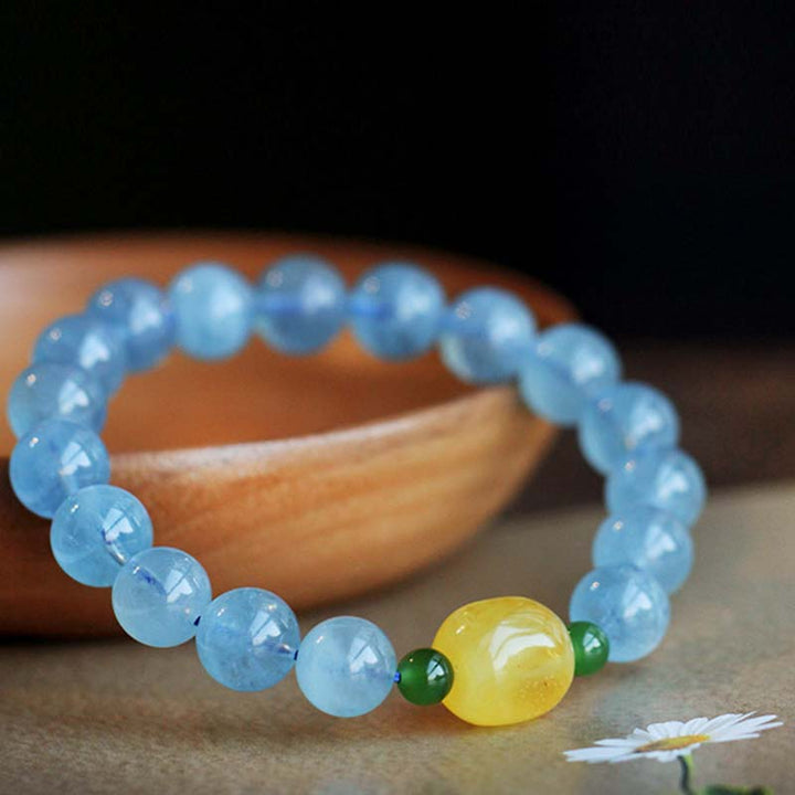 Pulsera curativa de serenidad con cuentas de ámbar y aguamarina natural
