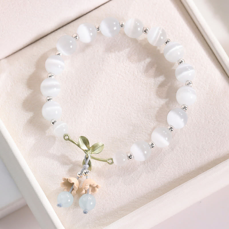 Pulsera con dije de orquídea de la paz, cristal rosa, calcedonia azul, aventurina verde, ojo de gato , Buddha Stones - Ojo de gato y calcedonia azul - image 2