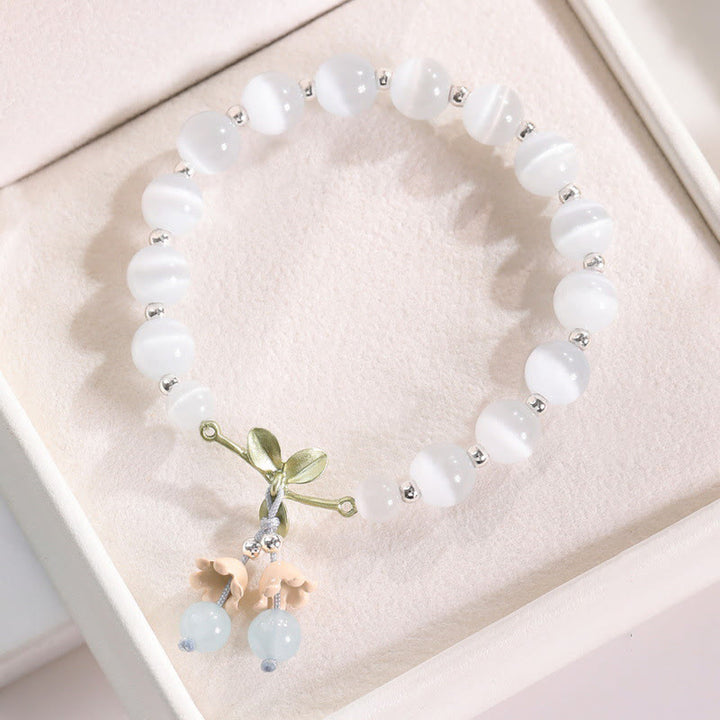 Pulsera con dije de orquídea de la paz, cristal rosa, calcedonia azul, aventurina verde, ojo de gato , Buddha Stones - Ojo de gato y calcedonia azul - image 2