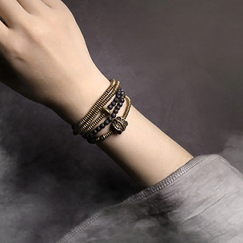 Pulsera multicapa curativa de cobre y roca de lava vintage con Buddha Stones