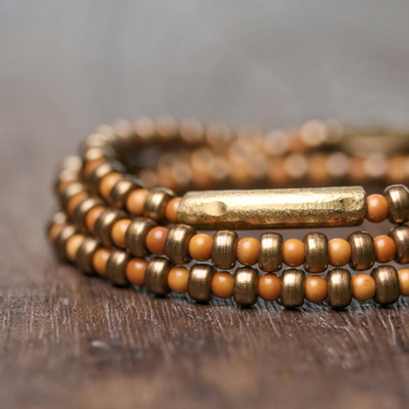 Pulsera de riqueza de cobre con hueso de olivo retro con Buddha Stones