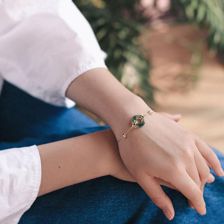 Pulsera de armonía curativa con peces Koi de jade cian y Buddha Stones