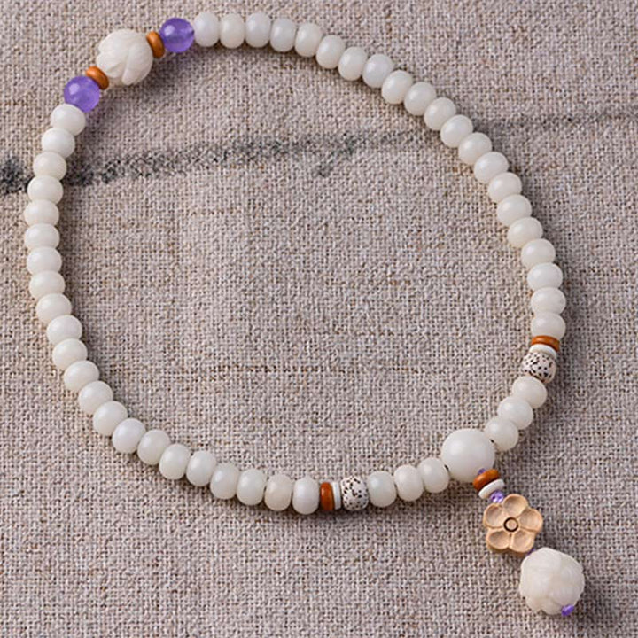 Pulsera de bendición de loto Bodhi de jade blanco tibetano con Buddha Stones